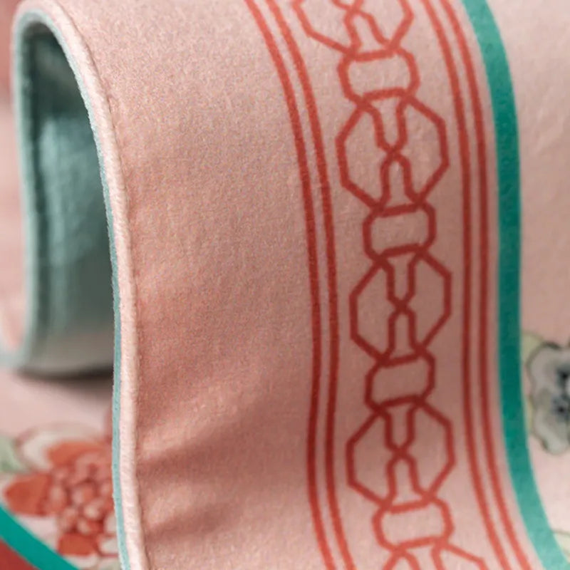 Soft plush texture of vintage blossom tablecloth.