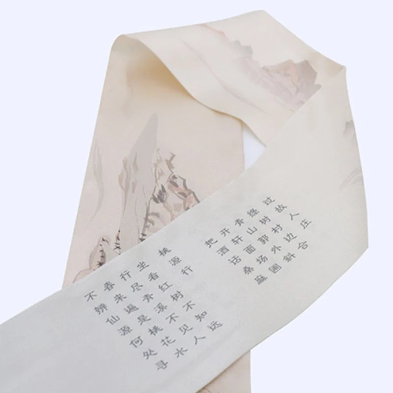 Close-up of the Wuling Retreat mulberry silk twilly featuring Chinese poetic calligraphy and subtle landscape artwork.