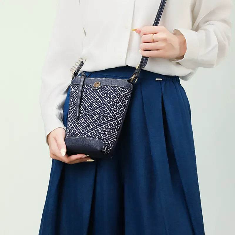 Zhuang Brocade Flying Swallow Motif Embroidered Leather Bucket Crossbody Bag - SinoCultural -- FJ210617