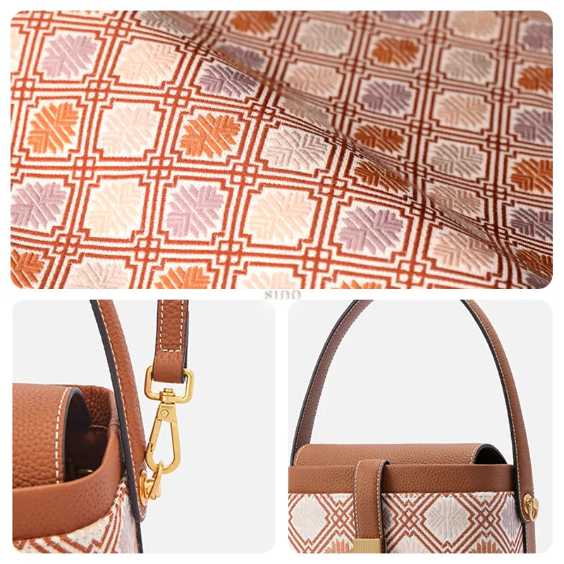 Close-up: Zhuang Brocade weave texture, hardware and leather strap.