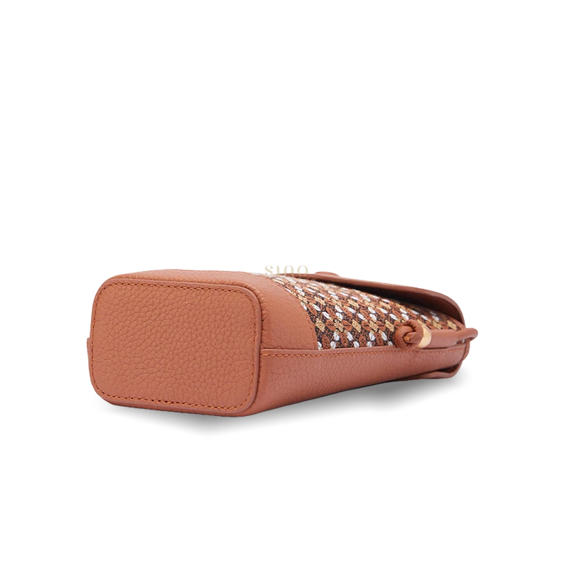 Brown Zhuang Brocade phone bucket bag bottom view showing the structured leather base and compact crossbody design.