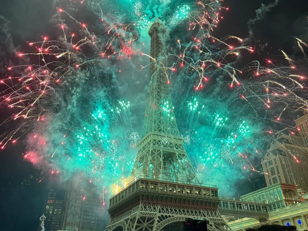 New Year's Eve fireworks over the Eiffel Tower replica at The Parisian Macau, marking the start of the new year.