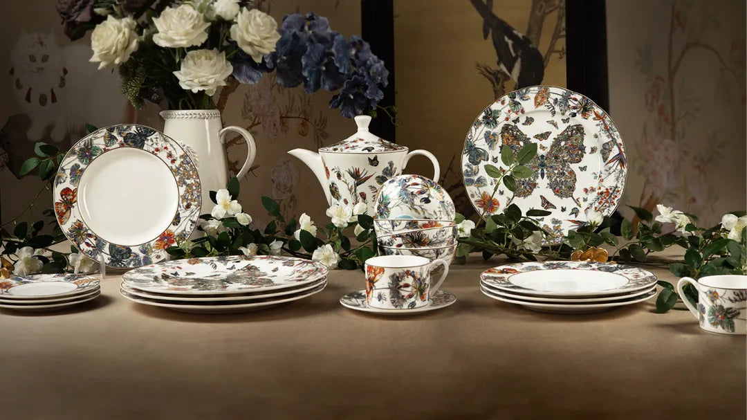 Complete set of bone china with golden dancing butterfly patterns, embodying sinocultural elegance for home cooking.