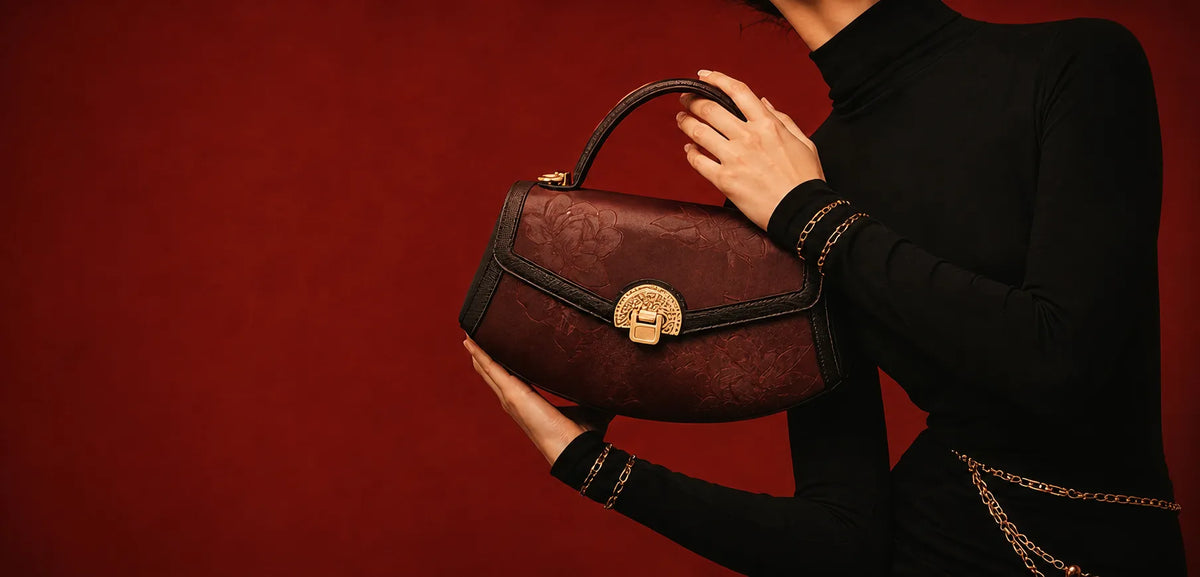 Luxury burgundy autumn handbag from Sinocultural’s Chinese-inspired collection featuring elegant floral patterns and traditional craftsmanship.