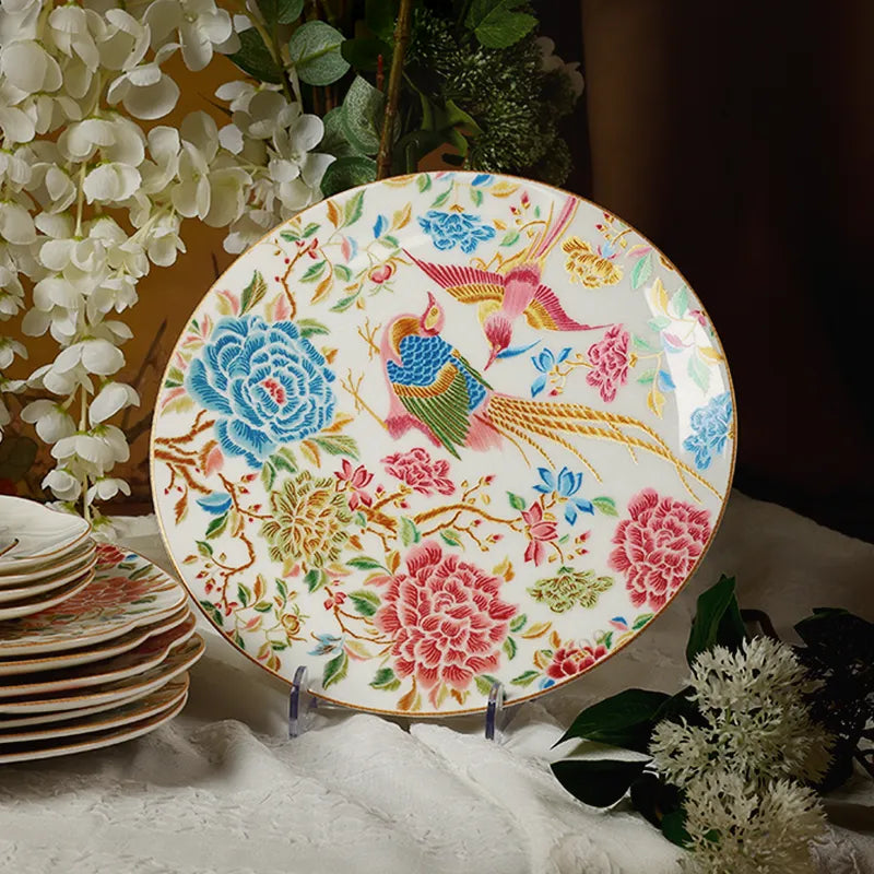 Chinoiserie bone china dinner plate standing upright on display.