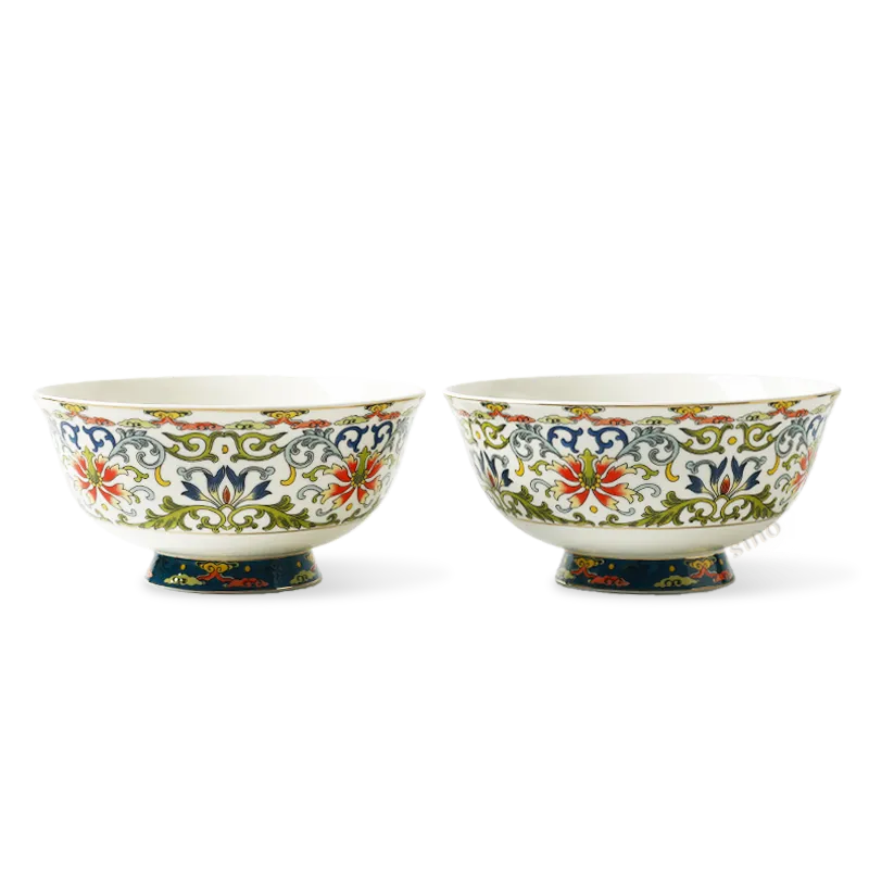 Pair of 6" bone china footed bowls on white background.