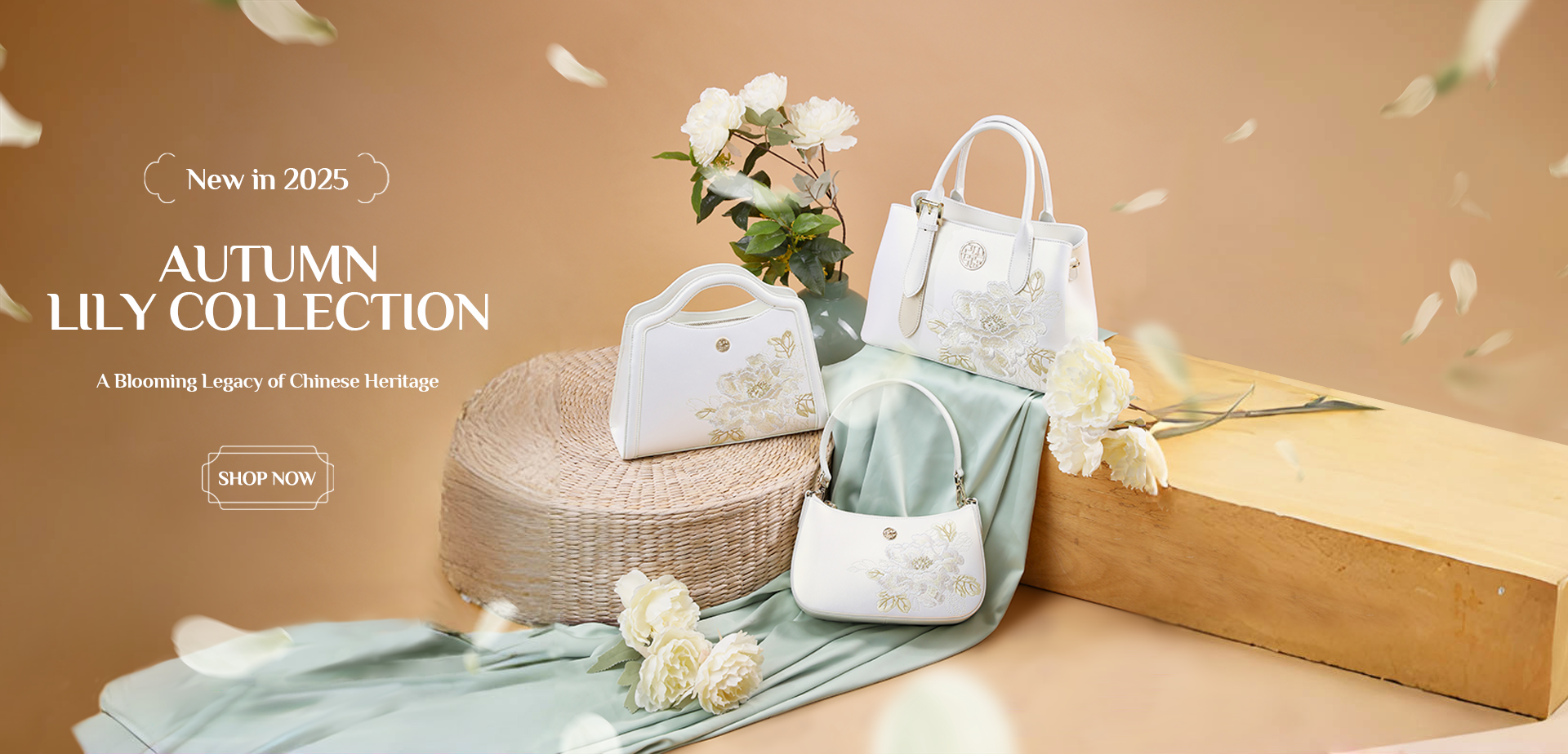 White peony-embroidered handbags from 2025 Autumn Lily Collection, styled with lilies and wicker.