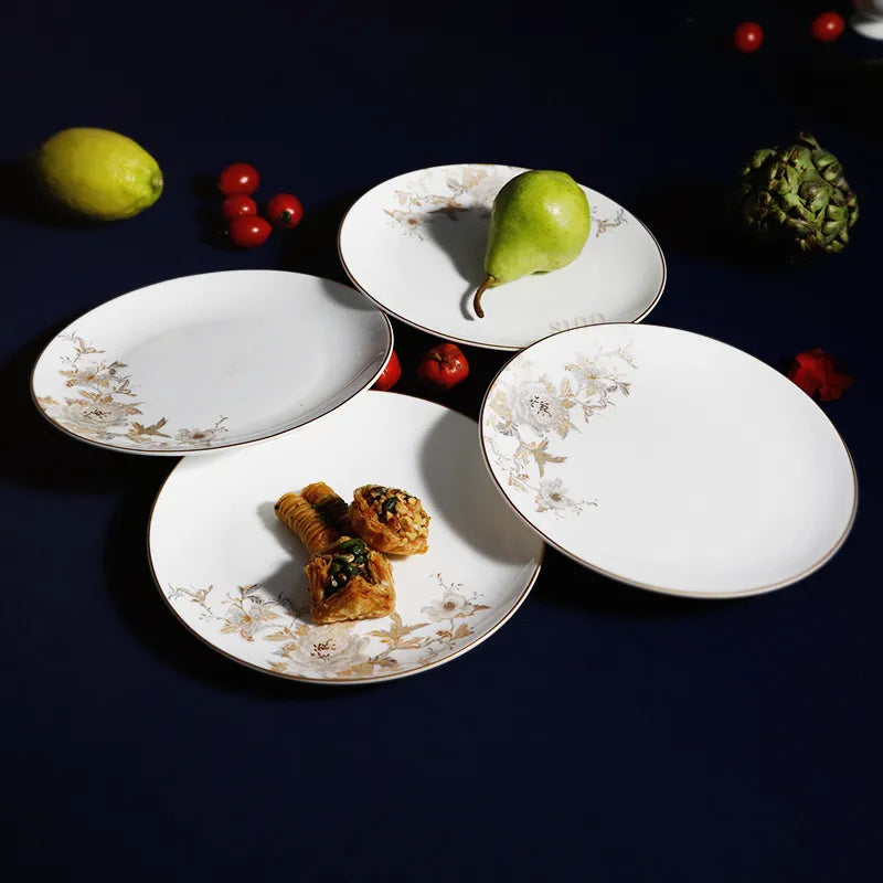 Stacked Chinoiserie Bone China Platters with pears and desserts, 45-degree overhead view.