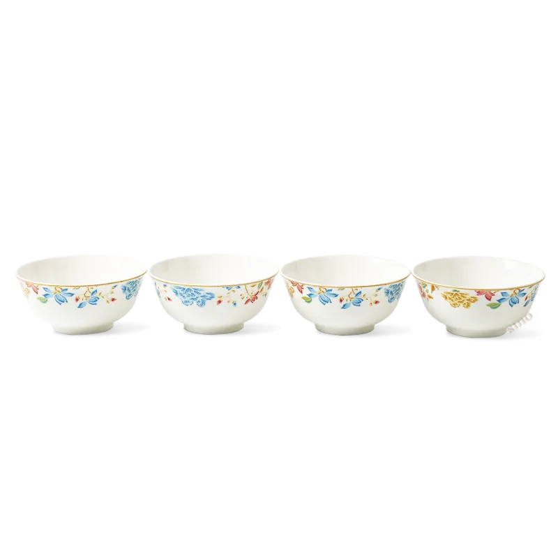 Four floral porcelain bowls aligned in a row showing consistent sizing.