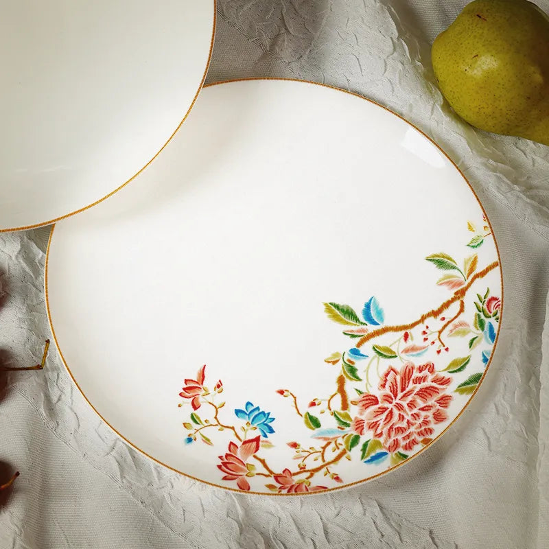 Chinoiserie salad plate flat on table showing texture and craftsmanship.