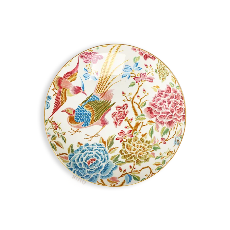 9’’ round bone china salad plate with floral and bird design.