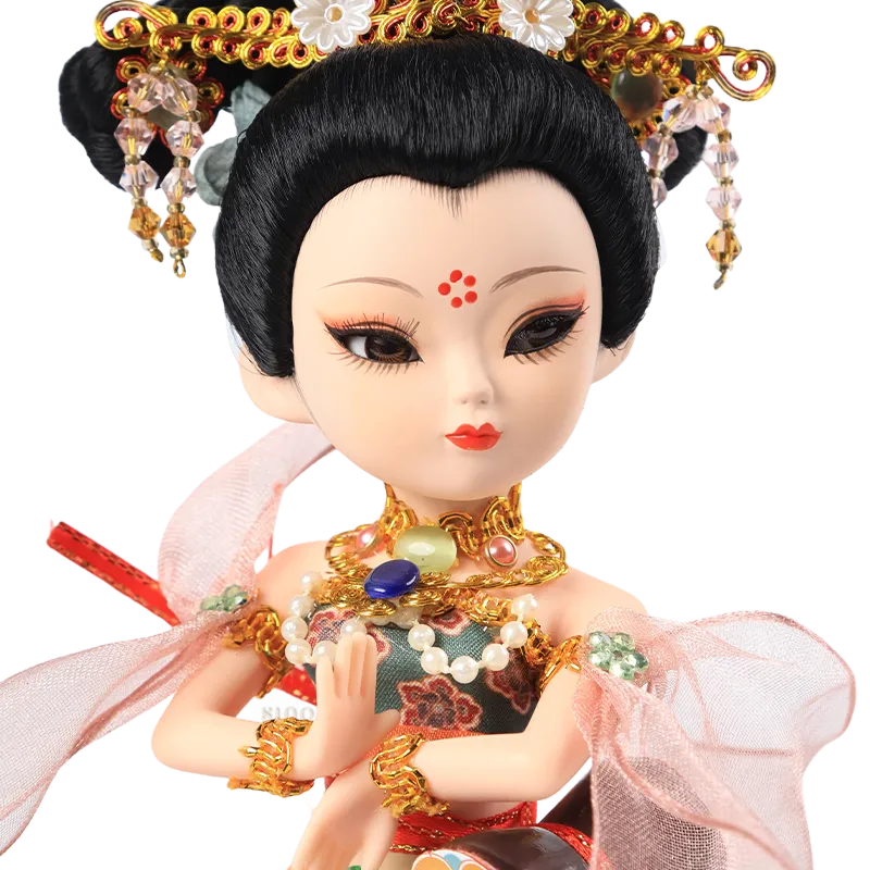 Front face of 9-inch Dunhuang "Drumming Grace" doll with drumming pose and beaded necklace.
