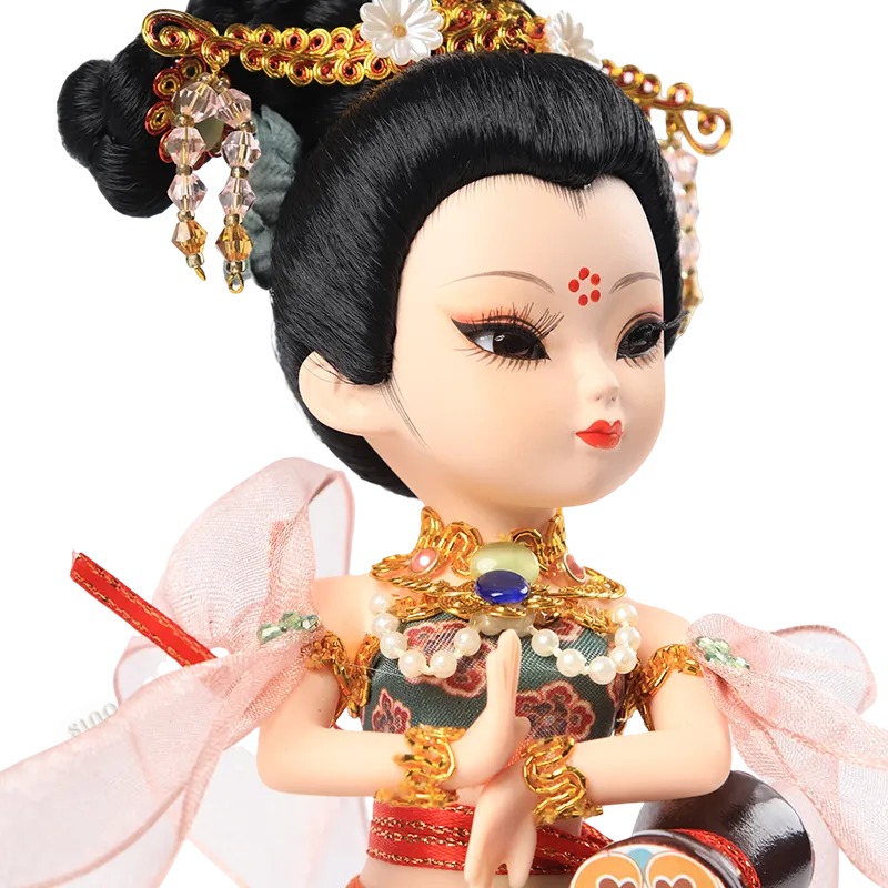 Right profile of 9-inch Dunhuang "Drumming Grace" doll showing drumming pose and hand gestures.