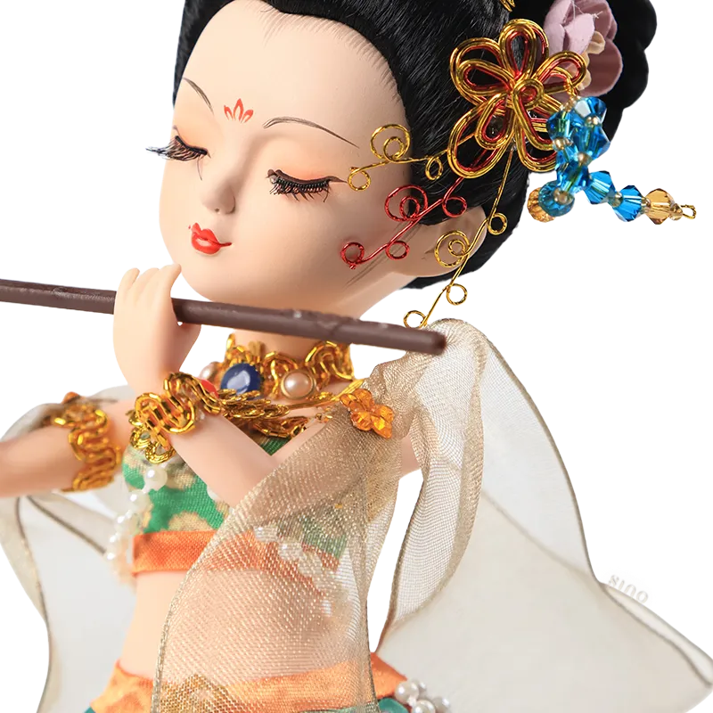 Left body and face detail of 9-inch Dunhuang "Flute Song" doll playing flute.