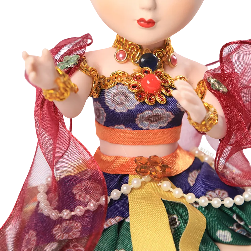 Body outfit detail of 9-inch Dunhuang "Harp Melody" doll with green/red layers and floral patterns.
