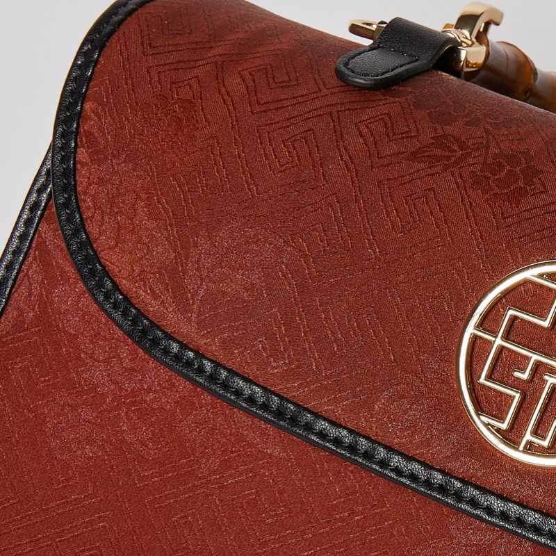Xiangyunsha Silk Bamboo Handle Brwon Handbag - SinoCultural