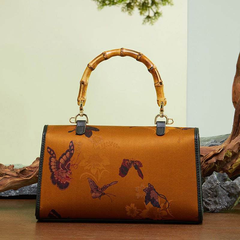 Xiangyunsha Silk Brown Butterfly Bamboo Handle Handbag - SinoCultural