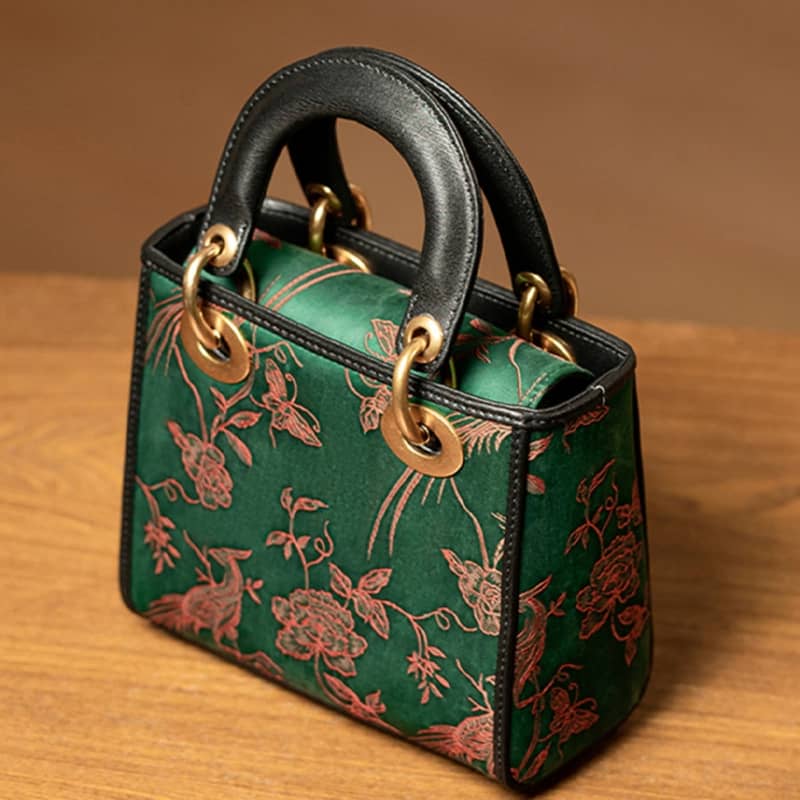 Xiangyunsha Silk Green Retro Cowhide Handbag with Pendant Sinocultural