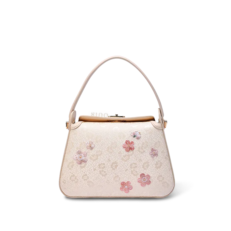 Embroidered silk handbag with ice-cracked plum blossom design.