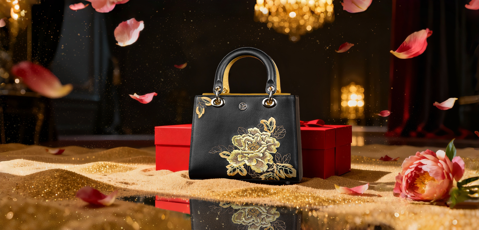 Black Friday sale banner: Black luxury handbag with golden peony embroidery, red gift box, and falling pink petals.