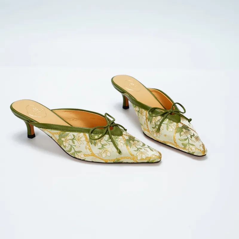 Chinese-inspired Dayun Brocade mules for women featuring traditional textile craftsmanship and elegant kitten heels.