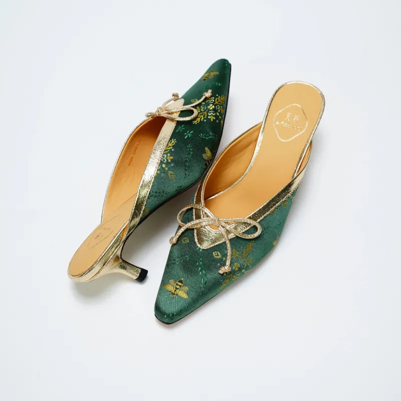 Chinese inspired Shu Brocade kitten heel mules showcasing elegant craftsmanship and refined construction.