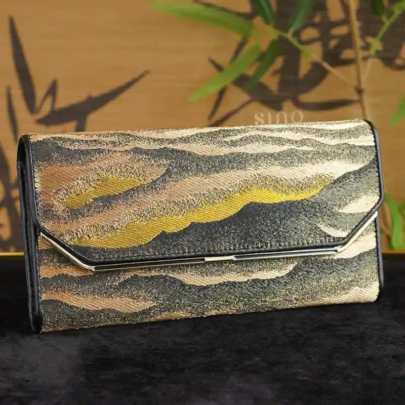 Chinoiserie Song Brocade leather long wallet for women featuring layered mountain peaks and flowing cloud motifs.