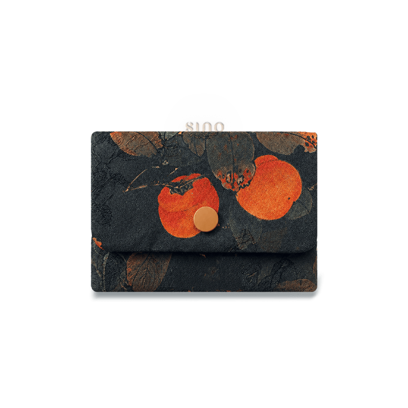 Front view of the Chinese Xiangyunsha Silk Auspicious Persimmon Snap Card Holder Wallet featuring a black background, vivid orange persimmon motif, and secure snap closure.