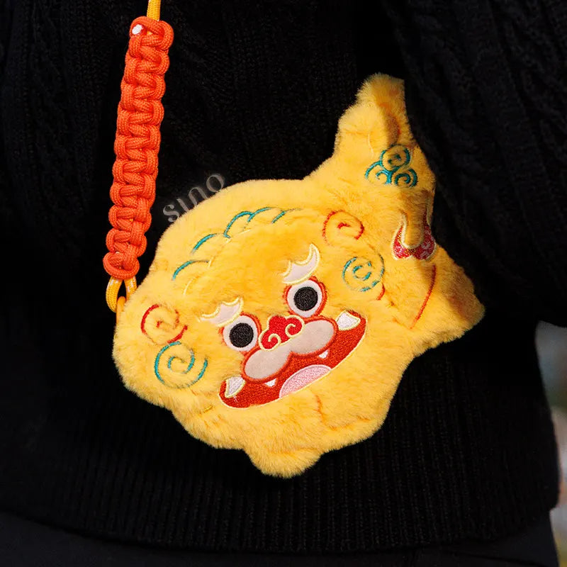 Crossbody wear image of the Chinoiserie Auspicious Lion Plush Mini Crossbody Coin Purse - Chinese New Year Gift, showing the plush lion purse as a cute mini crossbody bag and festive gift for kids.