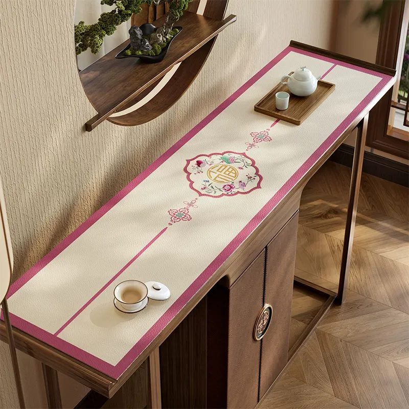 Chinoiserie coral pink leather cabinet top protector mat.
