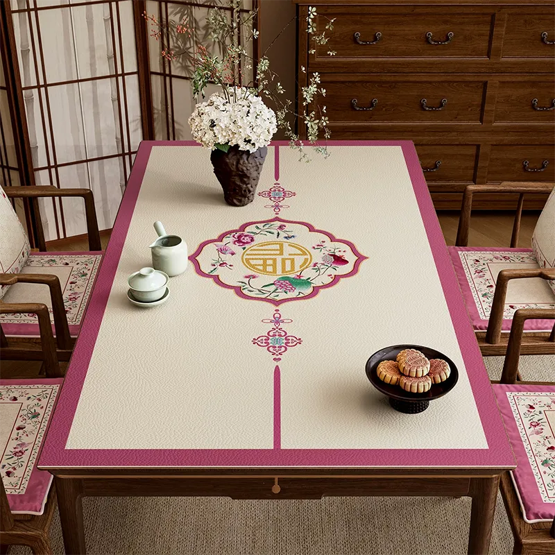 Chinoiserie coral pink leather dining table mat with longevity design.