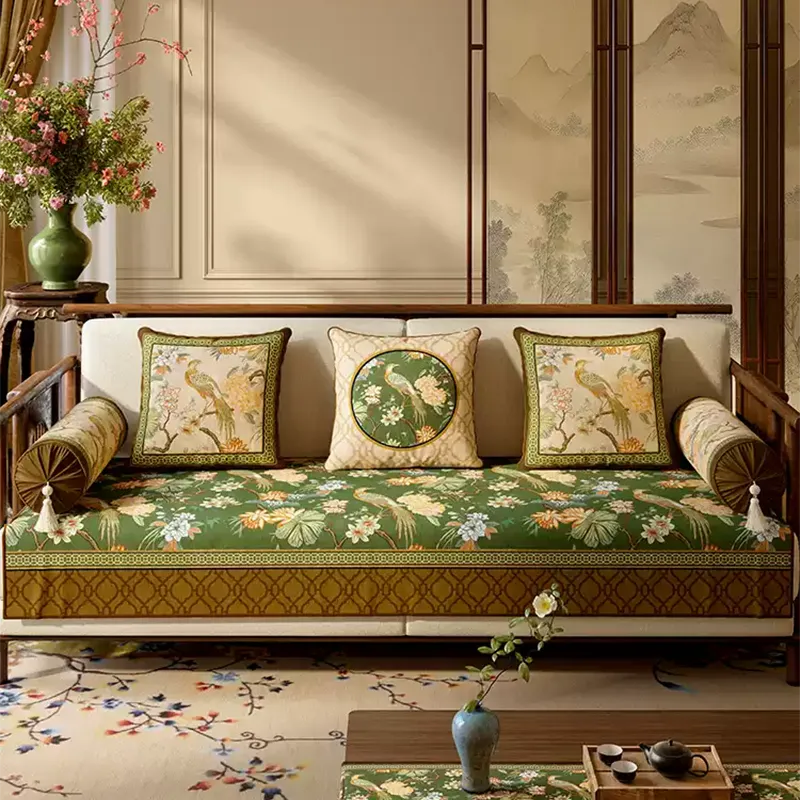 Emerald Chinoiserie sofa slipcover with bird and hydrangea botanical print.