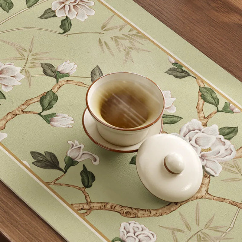 Top view pattern detail of Style A tea mat leather placemat with teacup.