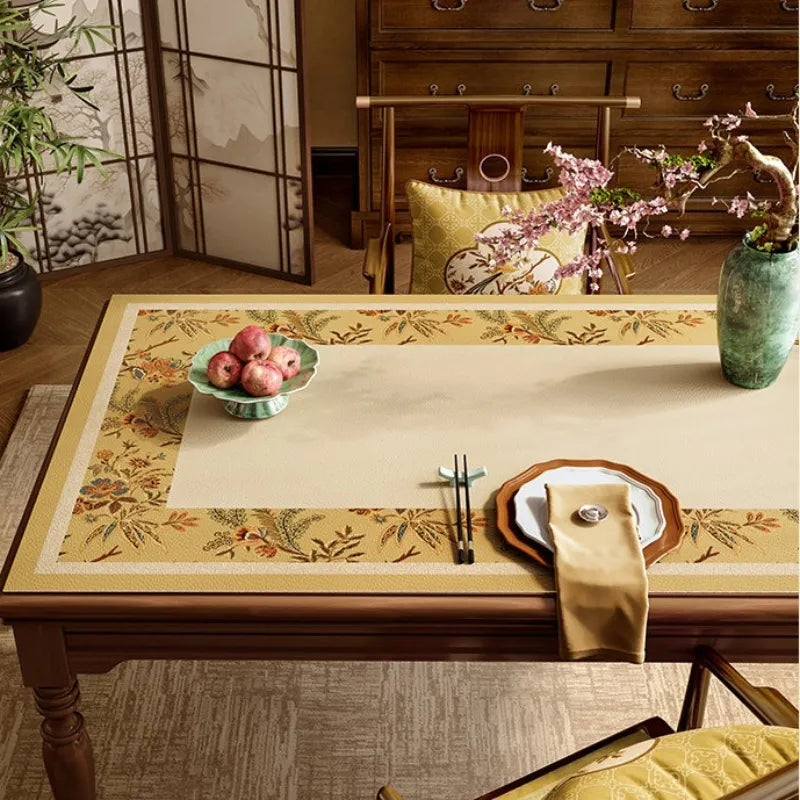 Golden Autumn Splendor dining table protector mat covering a wooden tabletop for decorative everyday surface protection.