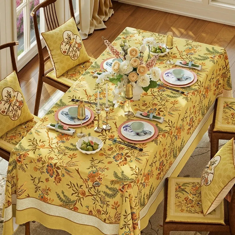 Autumn Splendor yellow dining tablecloth with Chinoiserie floral border adding warm seasonal style to a fall dining table.