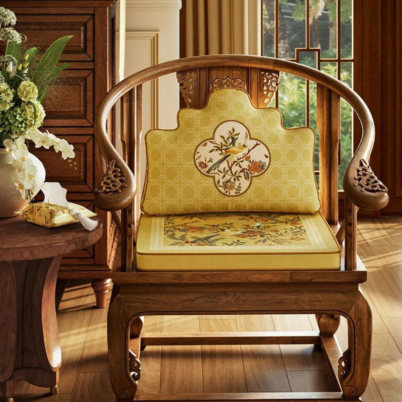 Autumn Splendor yellow lumbar support pillow styled on a wooden armchair with matching seat cushion for comfortable fall seating.