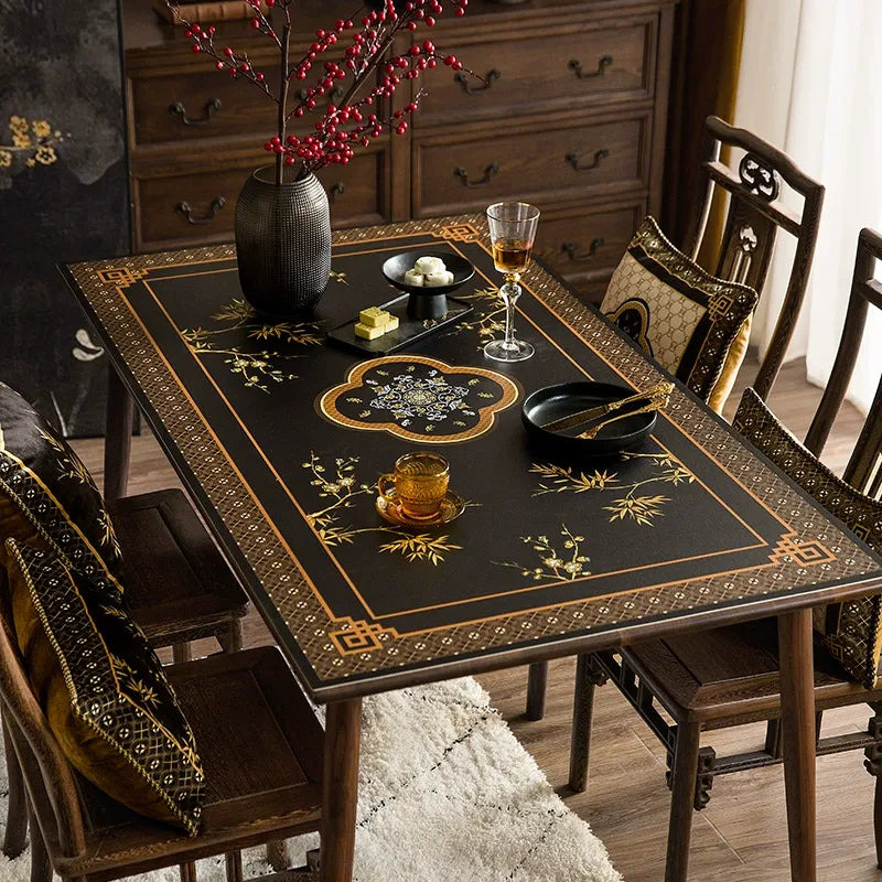 Black rectangular table mat with Chinoiserie bamboo & Ruyi pattern.