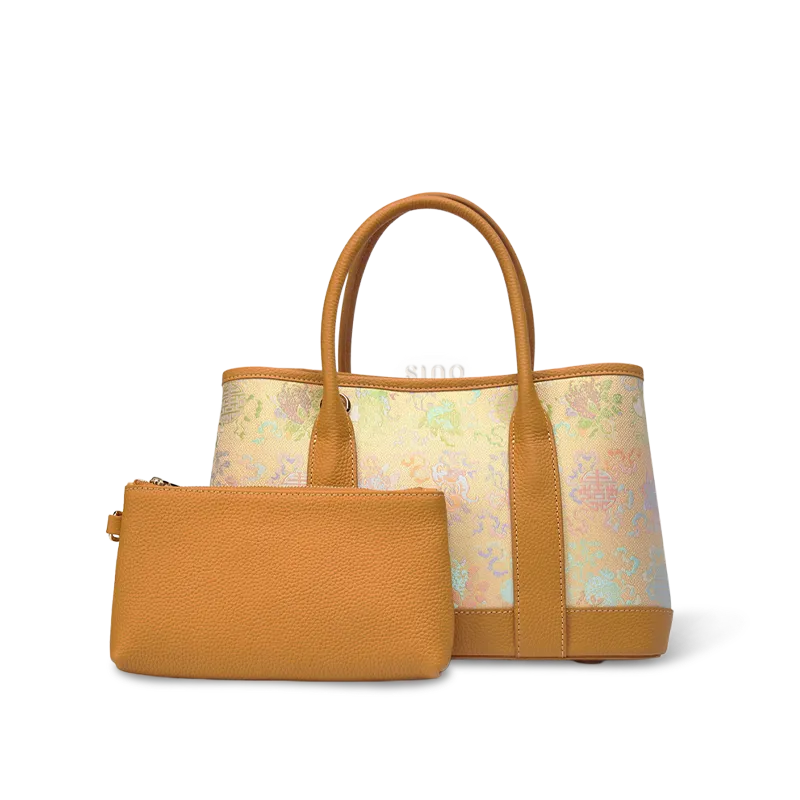 Front view of luxury gold-woven Song brocade double happiness floral tote bag with inner pouch on white background.