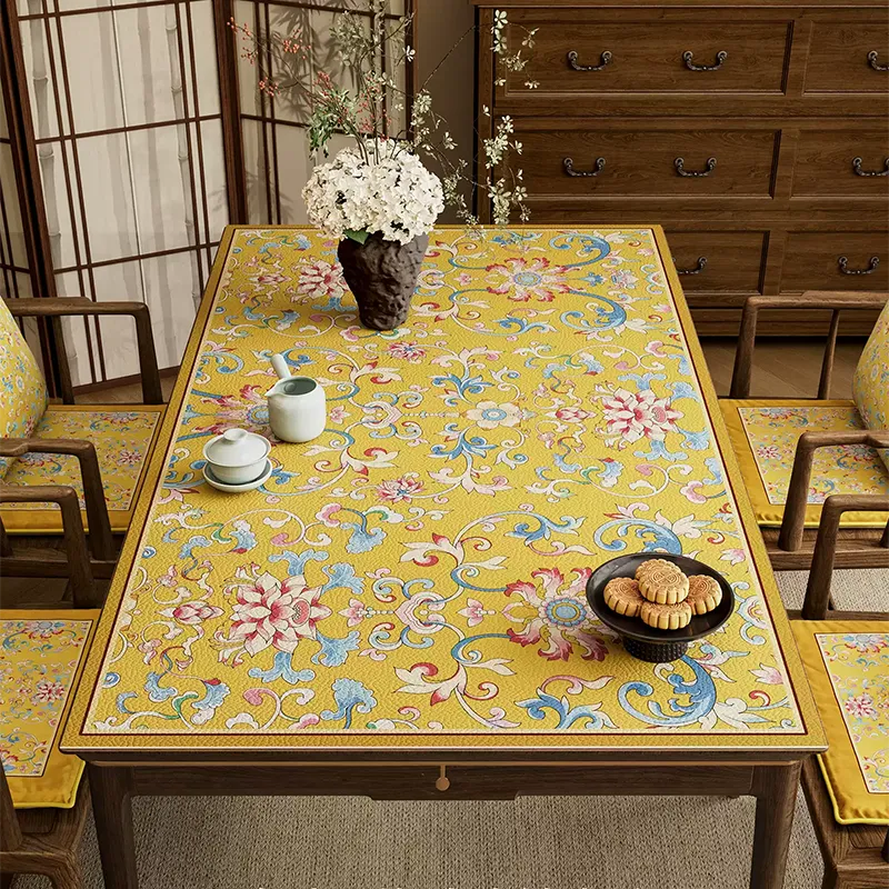Imperial yellow enamel floral leather table mat, chinoiserie luxury design.