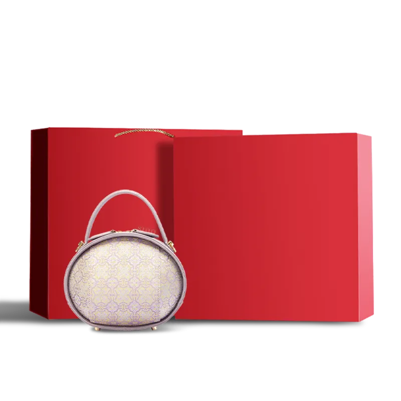 Lavender Song Brocade handbag in red gift box packaging.