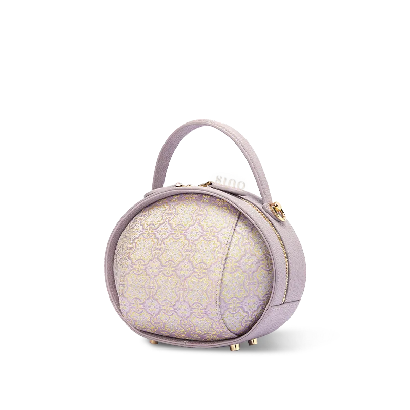 Side view of lavender Song Brocade handbag (Ding Sheng Pattern) on white background.