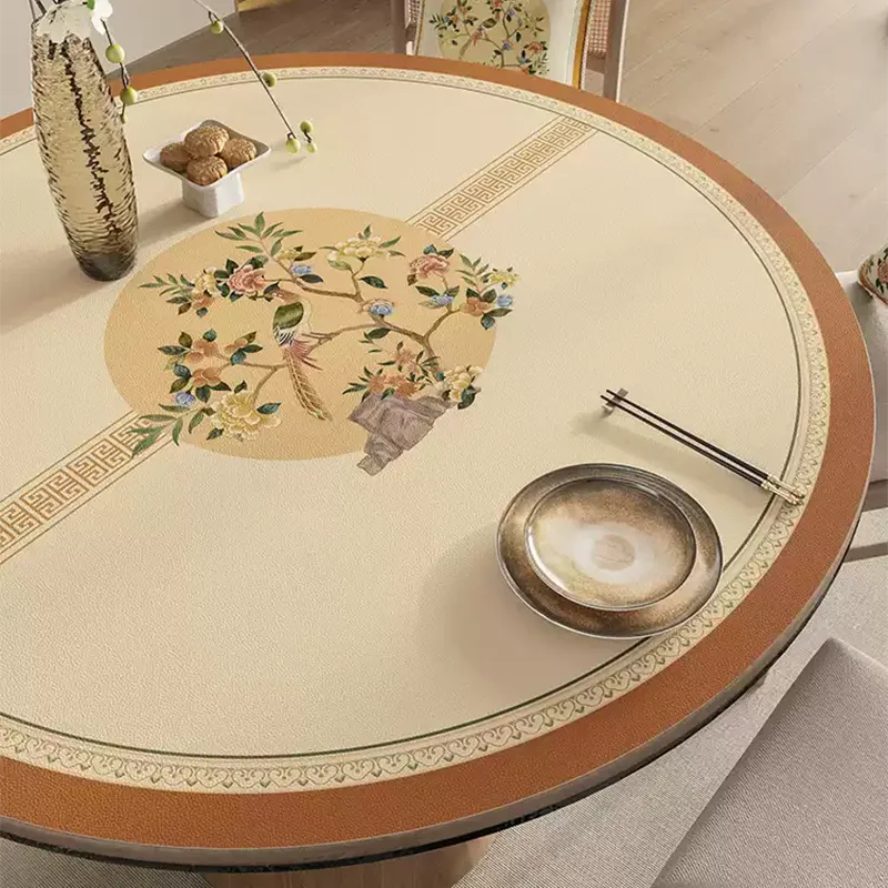 Right-side view of Chinoiserie round table mat with floral & songbird design.