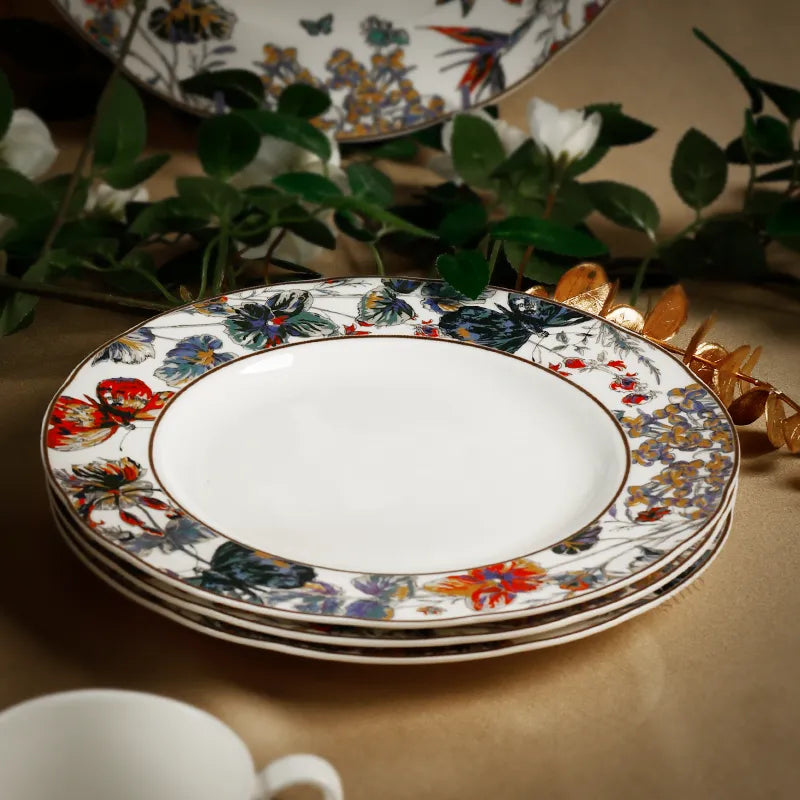 Three stacked luxury bone china plates with floral background - chinoiserie collection.