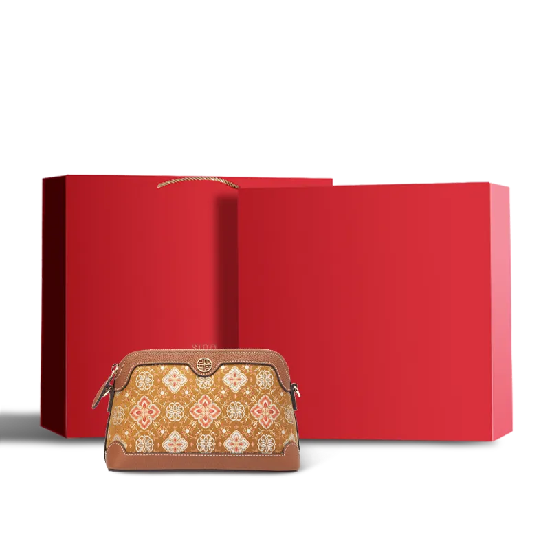 Chinoiserie Luxury Shu Brocade Persimmon Calyx Motif clutch bag in a red gift box.