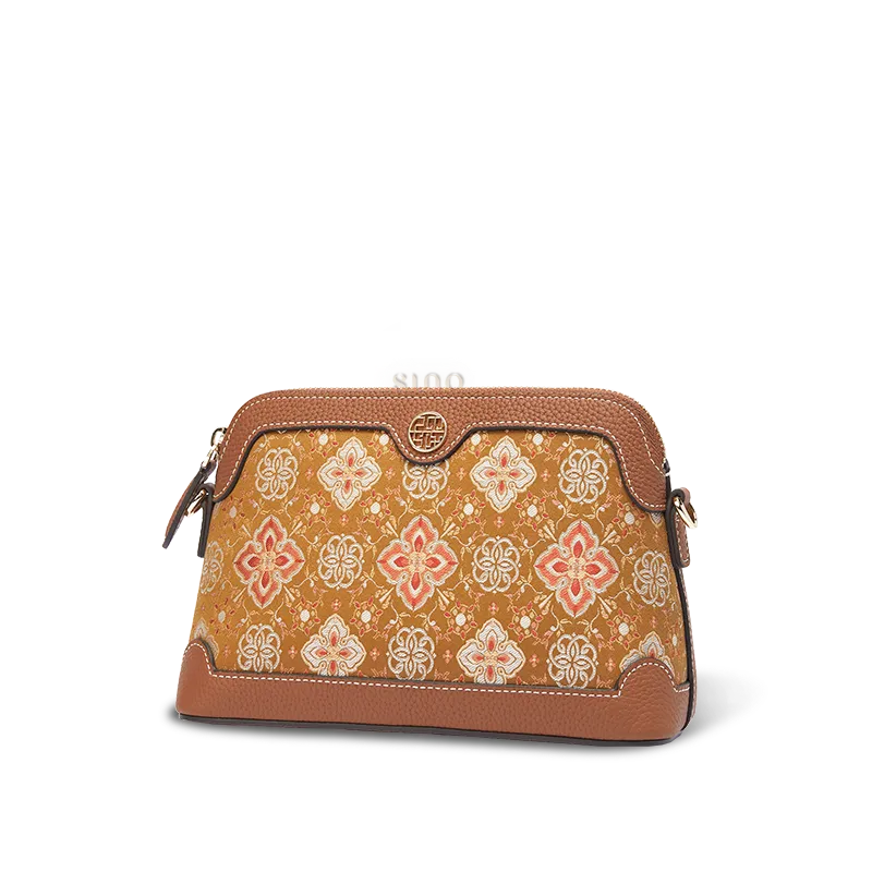 Side view of the Chinoiserie Luxury Shu Brocade Persimmon Calyx Motif clutch bag on white background.