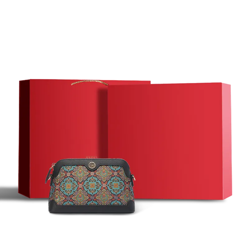 Chinoiserie Luxury Song Brocade Curled Lotus clutch bag presented in a red gift box.