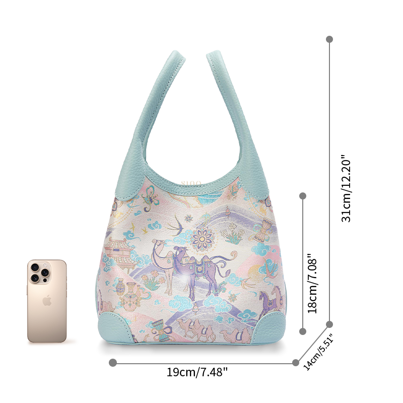 Size reference image of the Chinoiserie Luxury Song Brocade Silk Road Leather Basket Tote Bag, shown with a phone for scale and daily capacity.