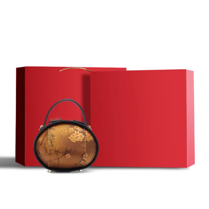 Black Xiangyunsha handbag with Plum Blossom Print in red gift box.