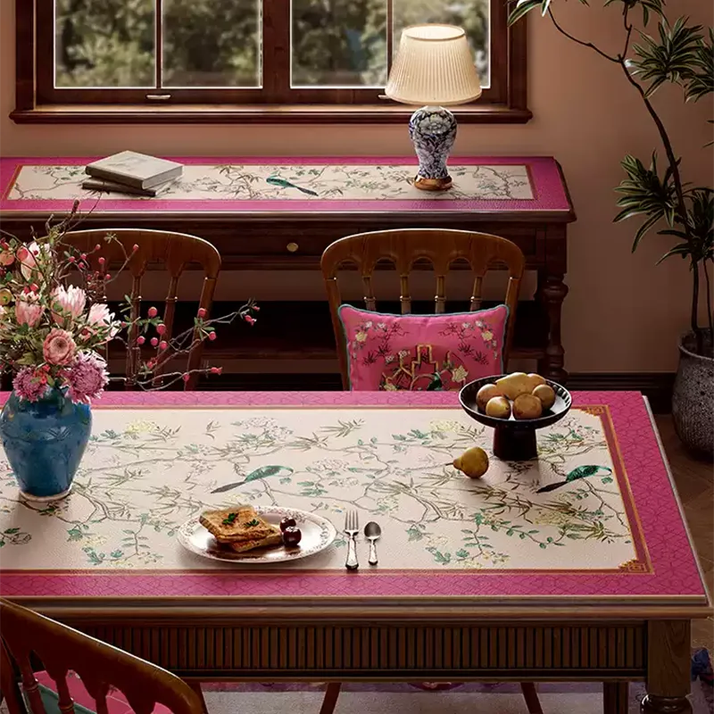 Pink chinoiserie floral bird table mat with light center.