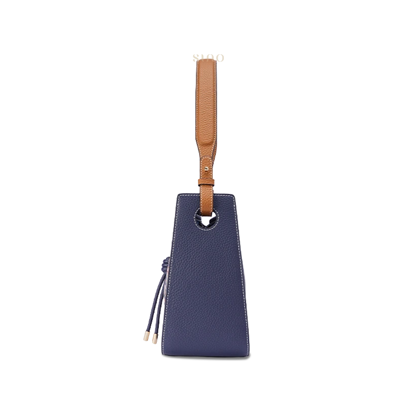 Moonlit Splendor large leather shoulder bag side view showing the structured silhouette and shoulder strap.